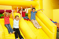 Kids playing on slide